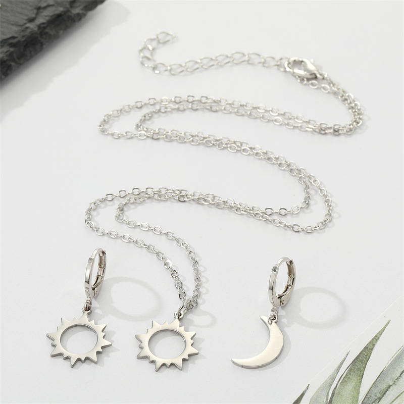 Korea Simple Alloy Hollow Sun Moon Asymmetric Earrings Necklace Wholesale