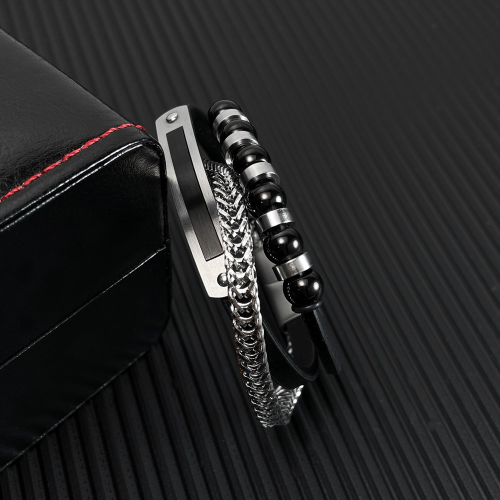 Europeiska och amerikanska handgjorda trendiga mäns svarta asymmetriska läderarmband med magnetspänne med flerlagers vävda läderarmband för män_voghion.com