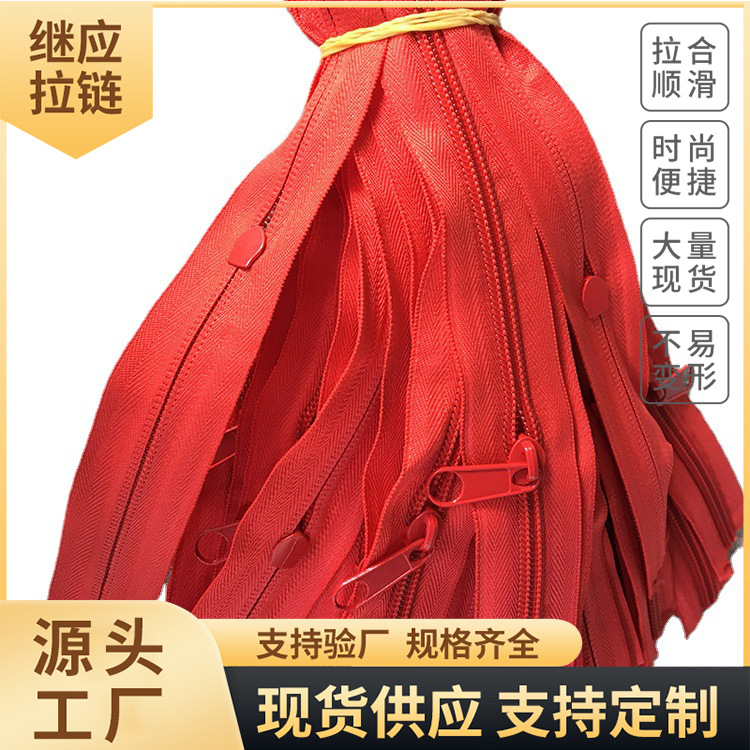 red nylon sleeping bag with zipper