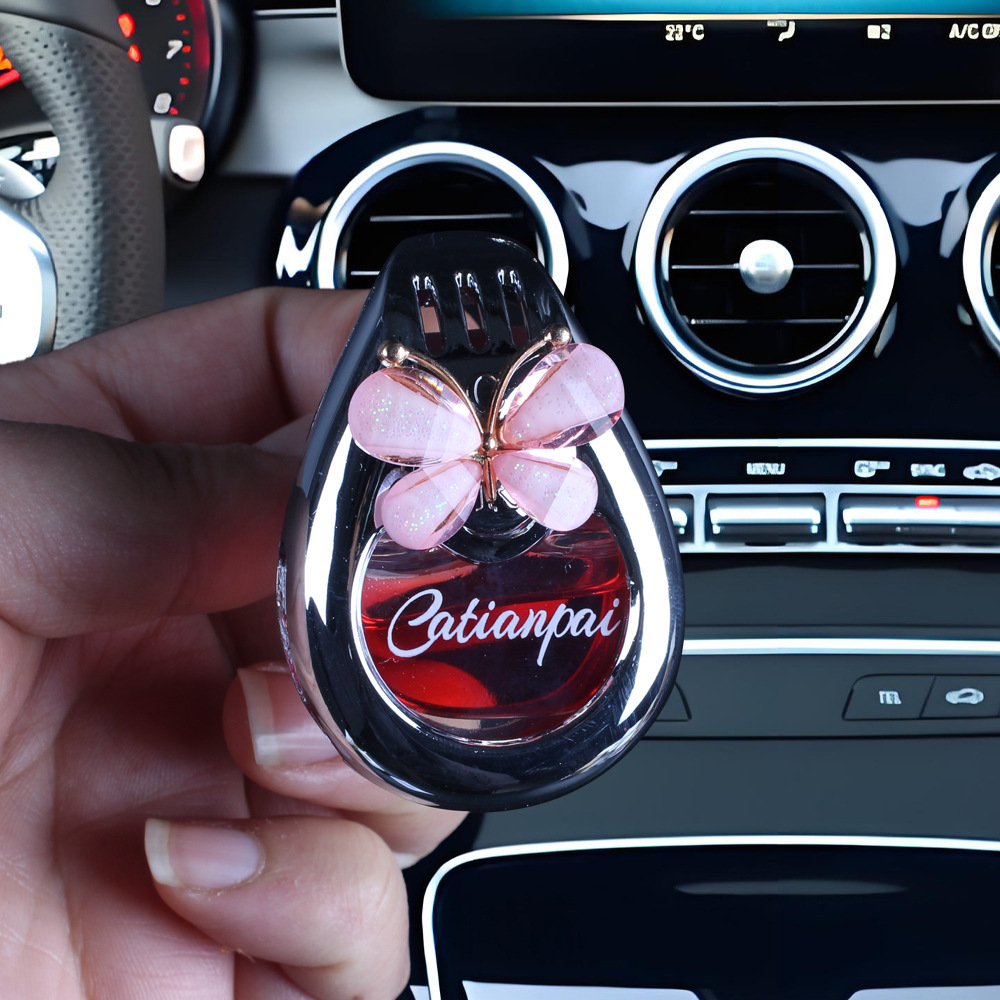 Aromaterapia para coche 2025 nuevo perfume de coche con lazo de fragancia de larga duración, adornos para coche, plástico de fragancia ligera de larga duración