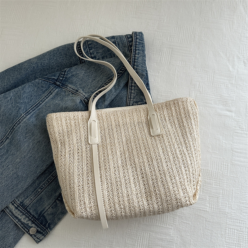 Bolsa de gran capacidad para mujeres 2024 nuevo bolso de paja de viaje de moda en línea bolso de hombro para trabajar