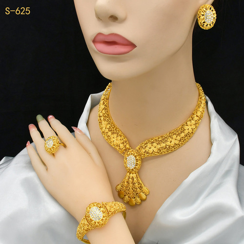 Gold-plated jewelry set for Nigerian bride, featuring an exaggerated flower-themed long necklace, ring, bracelet, and earrings set of four