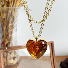 精美简约女士爱心项链琥珀色时尚个性感轻奢百搭饰品高级感毛衣链