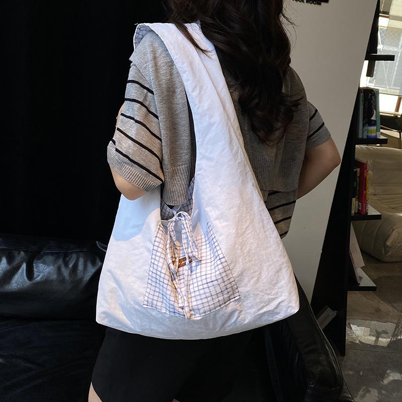 Bolso Tote de moda coreana 2025 verano nuevo bolso femenino a cuadros bolso de color en contraste bolso de lona de gran capacidad