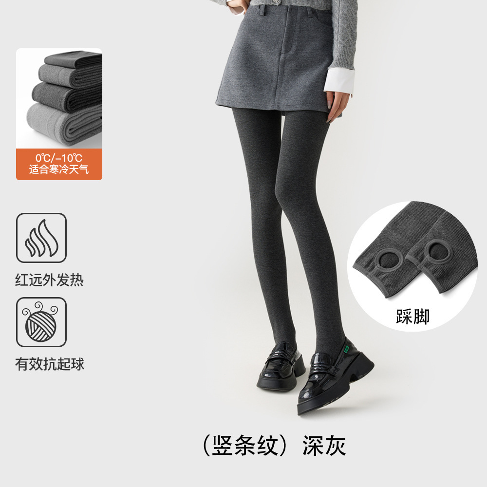 レギンスの靴下の女性は秋冬に厚い綿の縦縞のカシミヤの圧力を加えます。