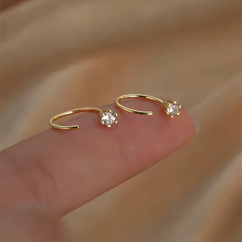 S925 plata esterlina chapado en oro 14K clásico seis garras ganchos de orejas de un solo diamante nicho para mujeres actualización simple de moda auriculares versátiles