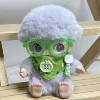 Apple, green glasses, bib, spoon
