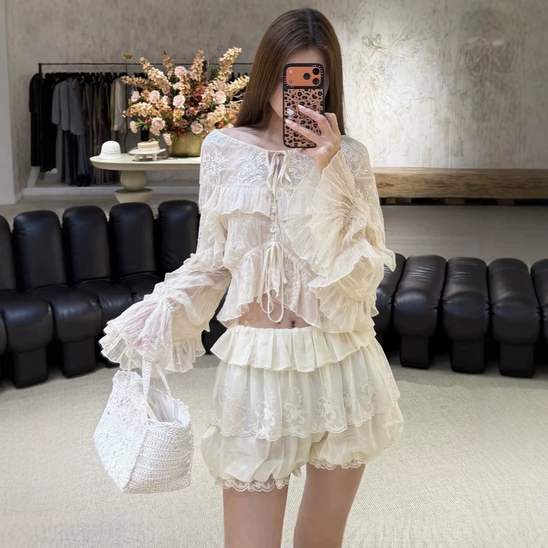 Autumn 2026 niche design lace resort-style ruffled short waist-cinching slimming drawstring tie cardigan top Autumn 2026 niche design lace resort-style ruffled short waist-cinching slimming drawstring tie cardigan top