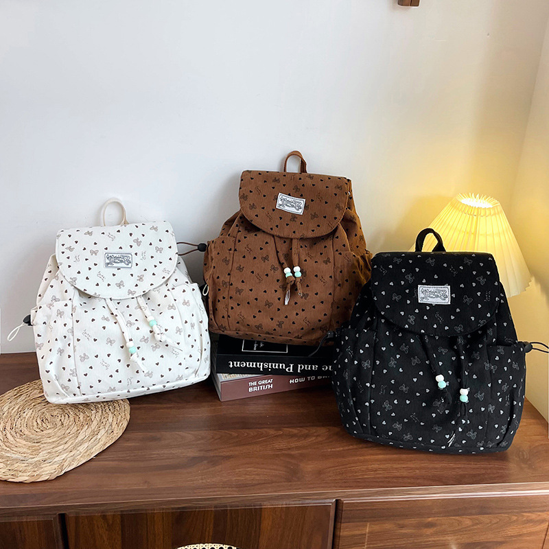 2026 mochila de viajes escolares de gran capacidad para mujeres coreanas frescas pequeñas ondas de diseño de moda mochila de moda mochila de moda