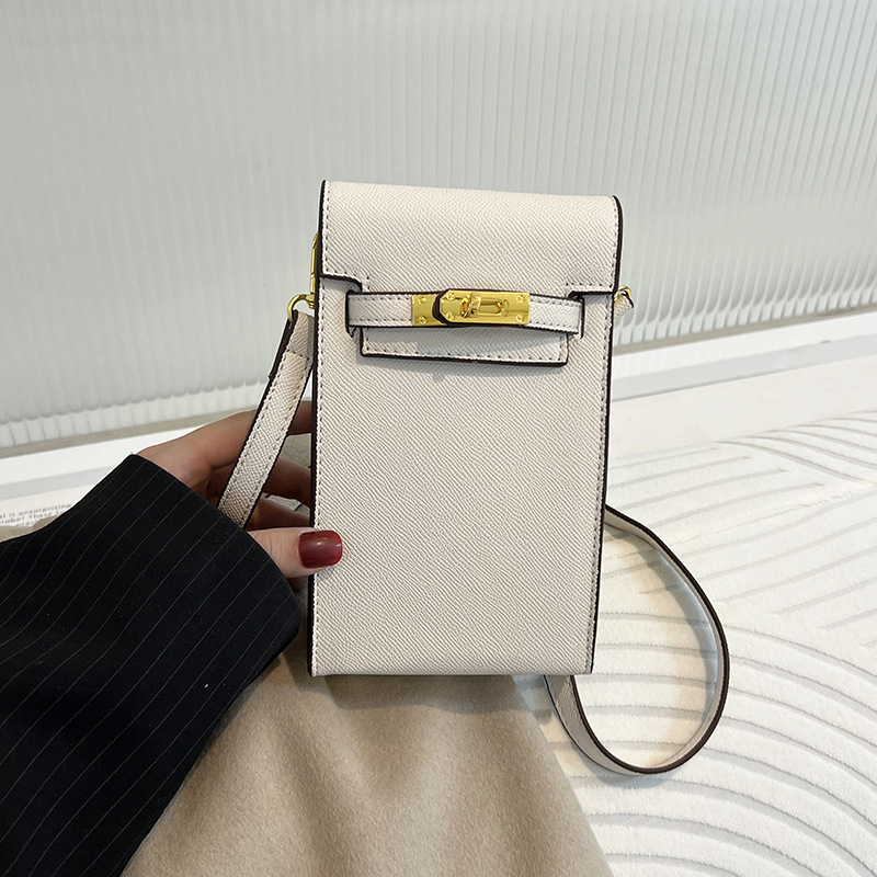 Bolsa pequeña texturizada para mujeres 2023 primavera y verano nueva moda retro bolsa de mensajero todo partido hombro teléfono móvil pequeña bolsa cuadrada