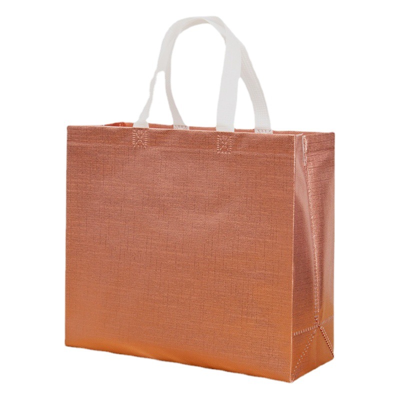 Prensa caliente color de impresión láser publicidad ropa compras no tejido bolsa Amazon moneda oro rosa bolsa de láser en stock