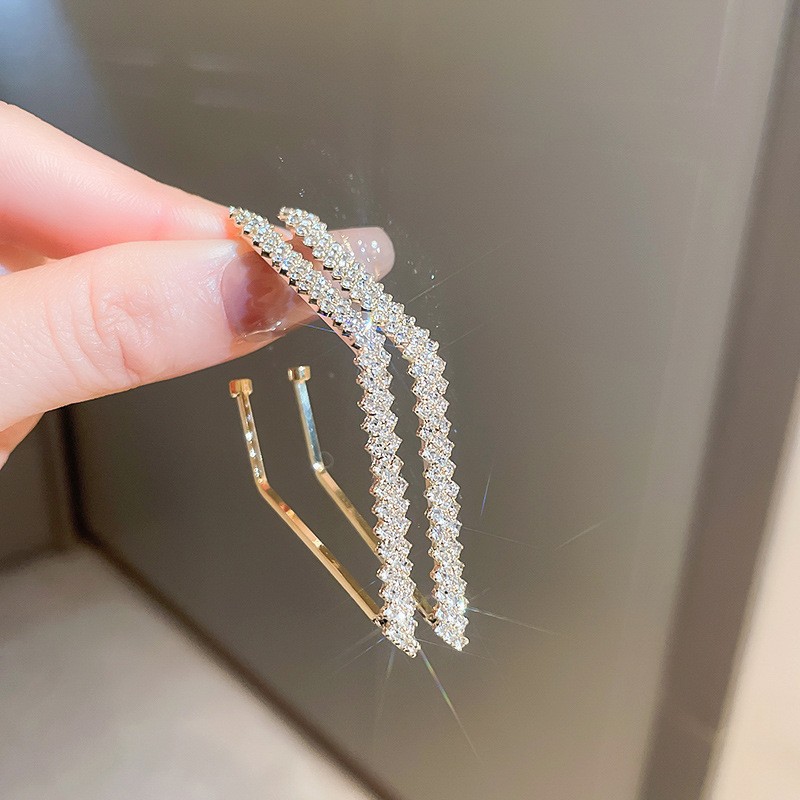 Pendientes redondos con aguja de plata retro estilo de Hong Kong goteo de aceite Pendientes de temperamento de nicho Pendientes de sentido avanzado femenino de verano ligero de moda