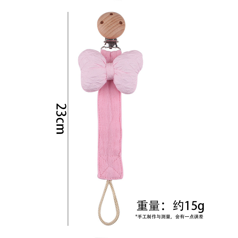 Nuevos productos para bebés clip de chupete de haya arco de dibujos animados cinta de satén de algodón y lino cuerda de chupete cadena de chupete de bebé