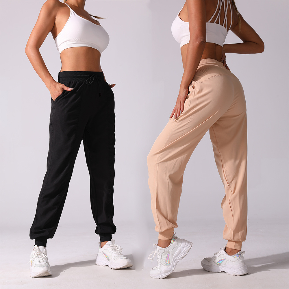 Nueva cuerda de bombeo plisada mujer deportiva de verano carrera rápida y seca pantalones de ocio de fitness transfronterizos ligeros, delgados y rectos pantalones de nueve puntos