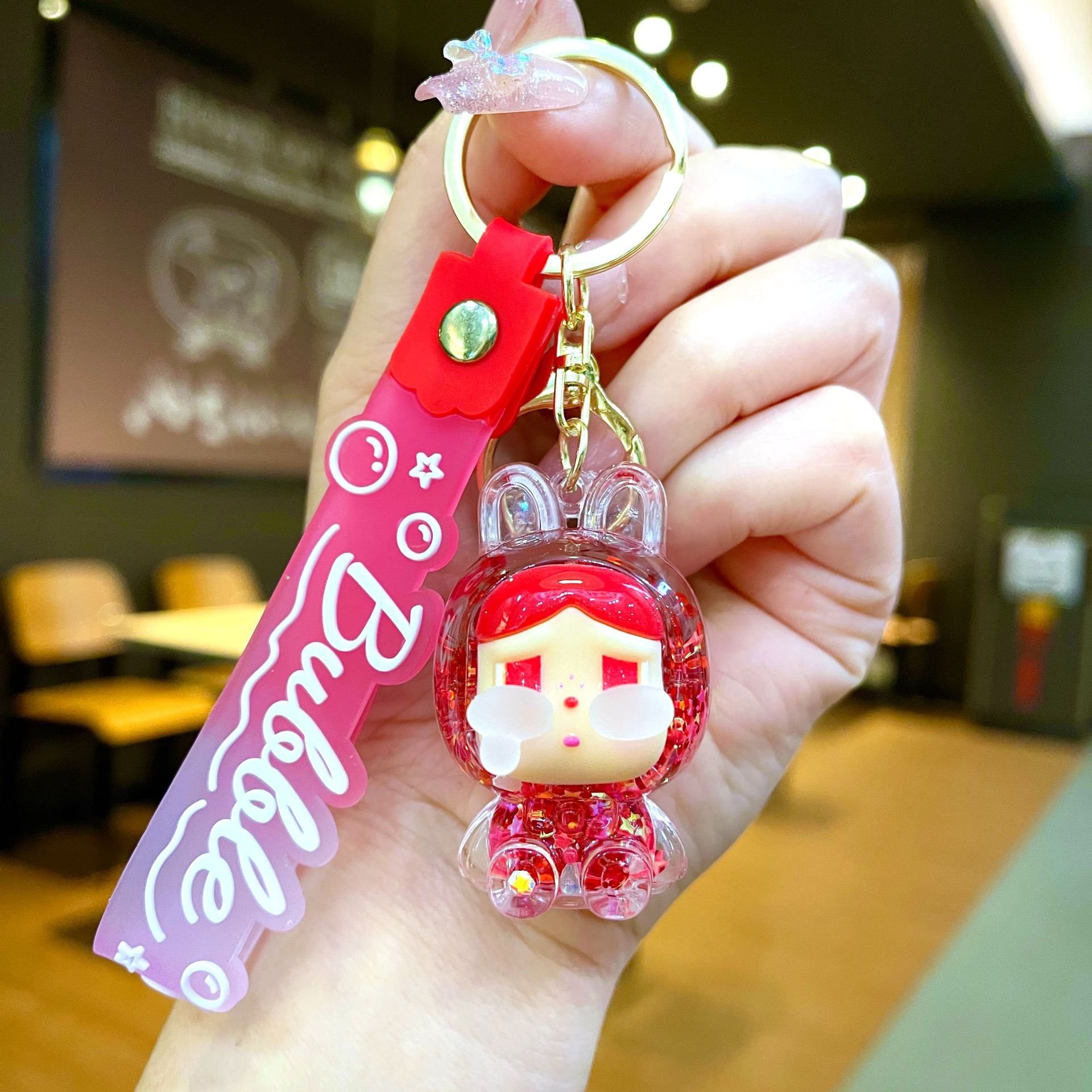 Llavero red acrílico con arena flotante