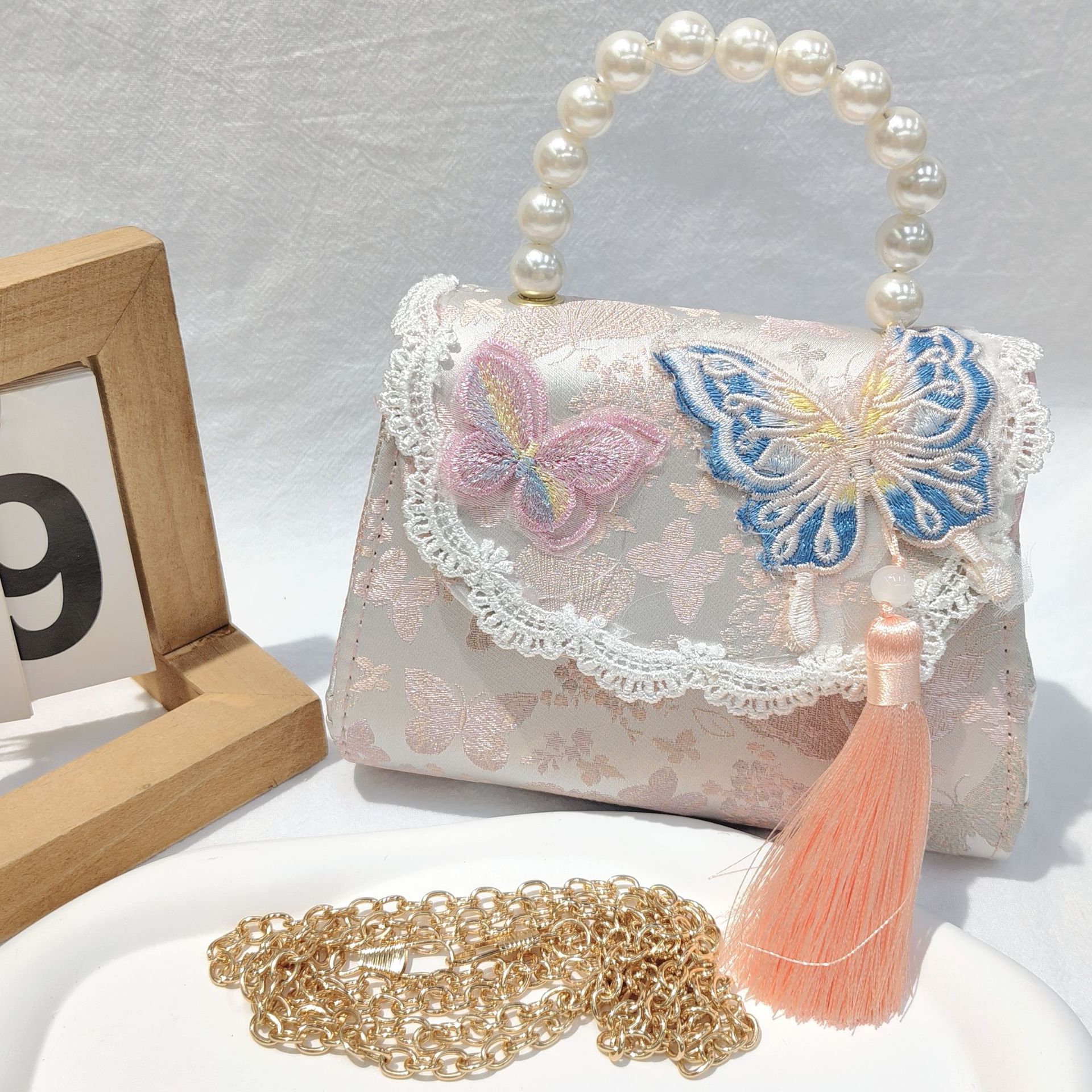 Bolso de arco para niños bolso de rosa de verano bolso de mochila para chicas bolso de princesa de perla pequeña bolsa de cambio de viento fragante