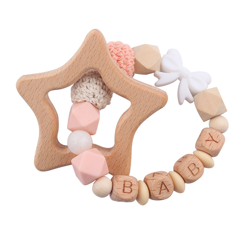 Nuevos productos para bebés abrazaderas de abrazaderas de haz de dibujos animados DIY pulsera de dientes molares decoración colgante de campana cuatro piezas