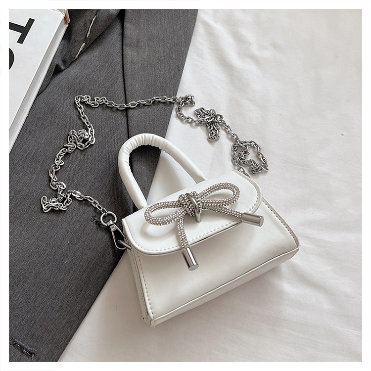 Ins niche French textured bag female 2024 new bow small square bag stylish shoulder messenger bag_voghion.com
