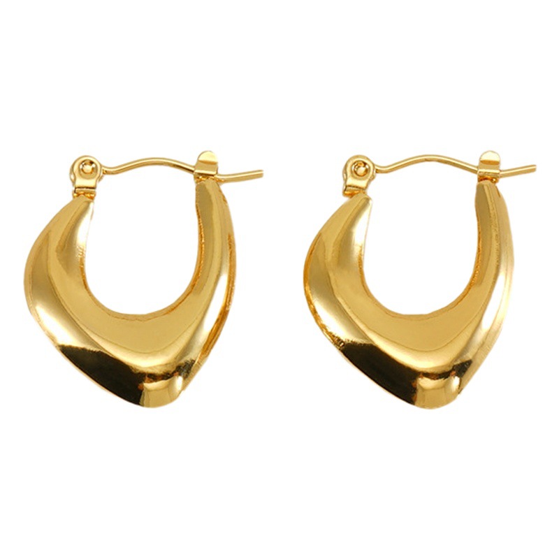 Cross-border europeo y americano de alta calidad de acero inoxidable 18K chapado en oro retro diseño hueco pendientes de ojo verde pendientes