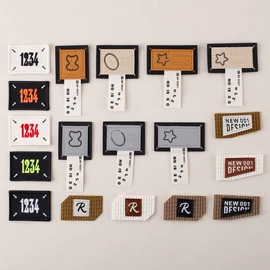 布贴;洗唛、商标;服装饰品