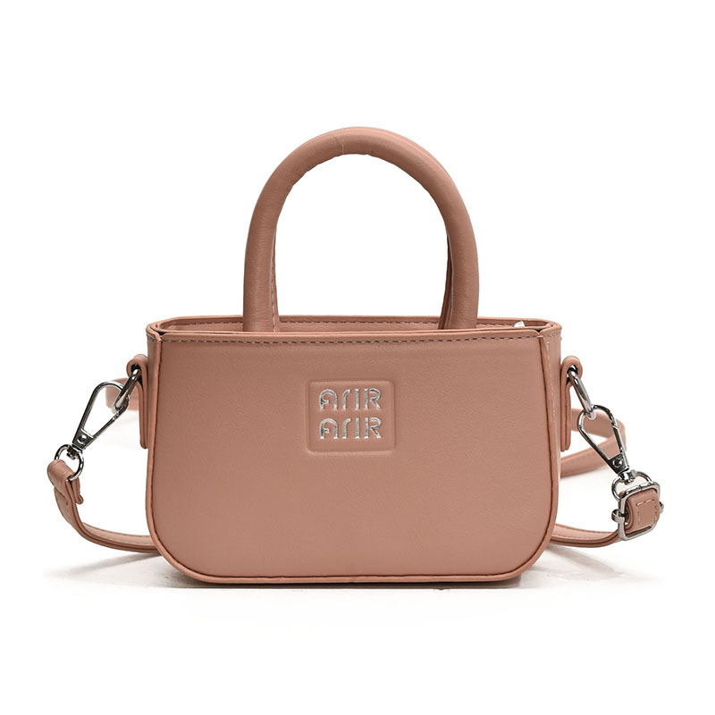 Coreana para niños y niñas bolsos pequeños, mini lindos bolsos de bebé de color sólido de moda 2025 nuevos niños bolsos de hombro