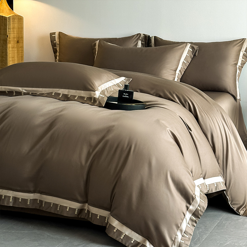 2025 nueva clase A 100 algodón de lana larga de Xinjiang algodón puro algodón de cuatro piezas ligero bordado de lujo algodón conjunto de cuatro piezas