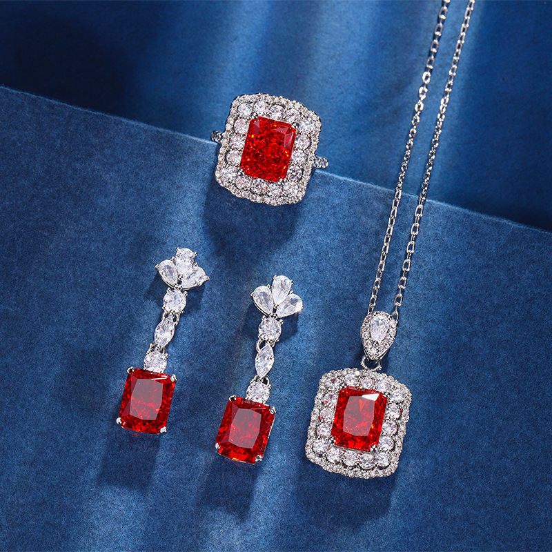 Otoño e invierno nuevo Zhuang Sheng joyería de alto carbono diamante hielo flor corte cobre incrustaciones chino cubo rojo azúcar traje mujer piedra principal 8*10