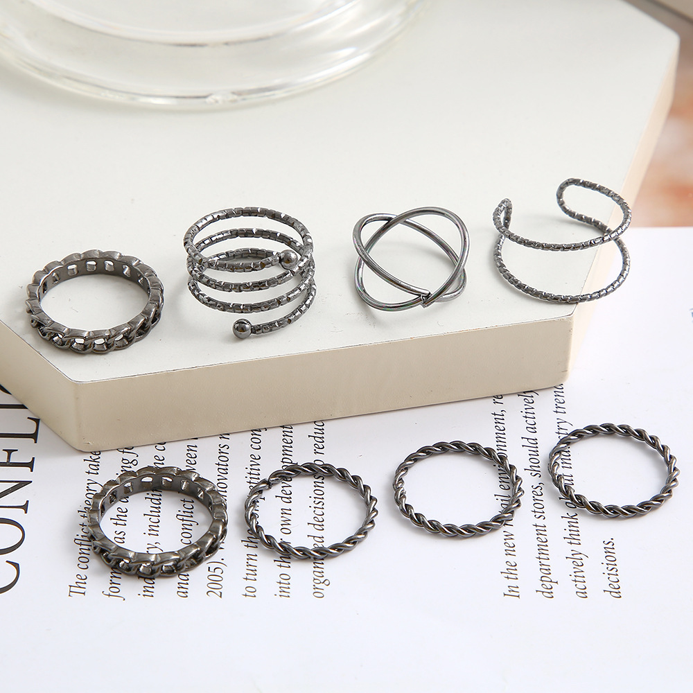 Creative Simple Geometric Cross Twisted Black Knuckle Ring 8 Piece Set display picture 2
