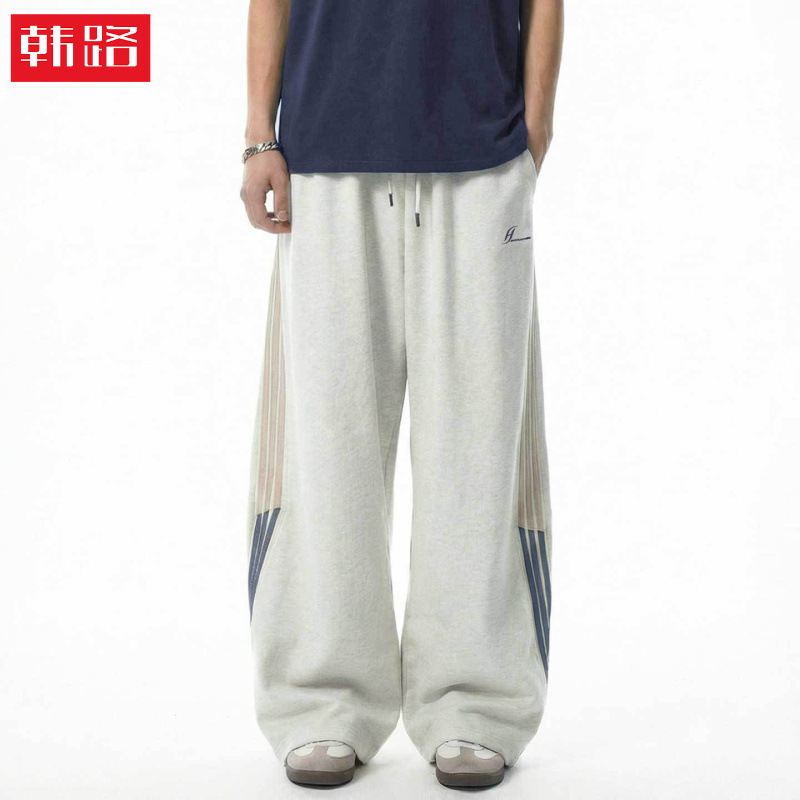 Trendy Brand Loose Casual Sweatpants for Men, Spring Style with Side Color-Blocking Stripes, Adjustable Cuffs, Sports Pants Trendy Brand Loose Casual Sweatpants for Men, Spring Style with Side Color-Blocking Stripes, Adjustable Cuffs, Sports Pants