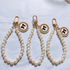 Pearl pendant bracelet, oil-drop shaped round bow pearl phone chain, pearl headphone chain