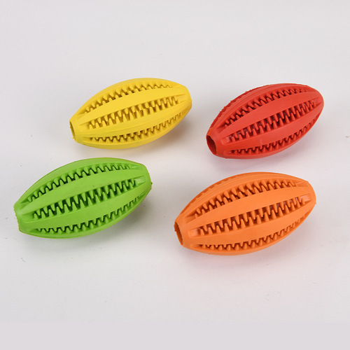 TEMU dog toy pet chewing molar football rugby bite-resistant and unbreakable thorn ball educational rubber leaking ball supplies
