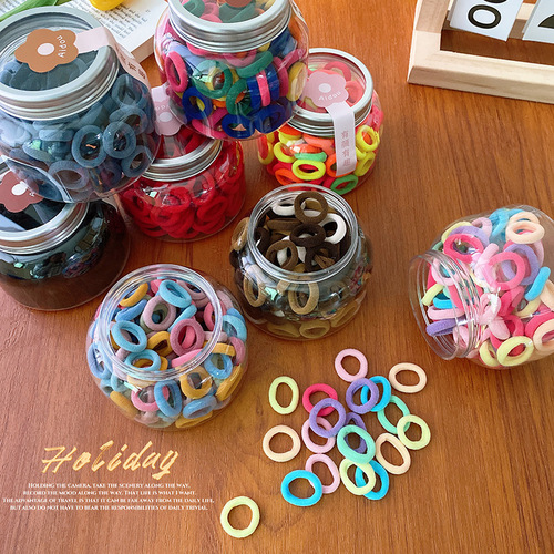 100 cans of candy-colored basic small children's finger towel rings that do not hurt hair and are versatile for girls to braid.
