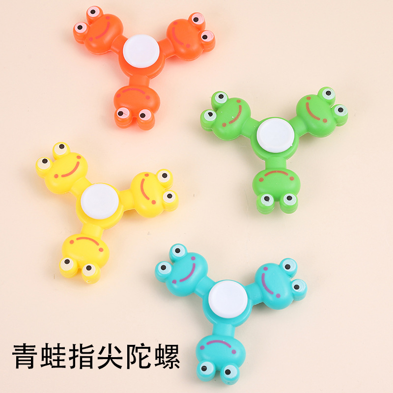 Cadena transfronteriza punta de dedo giroscopio estand rotatorio de descompresión de regalo de jardín de infantes azúcar juguetes descompresivos al por mayor
