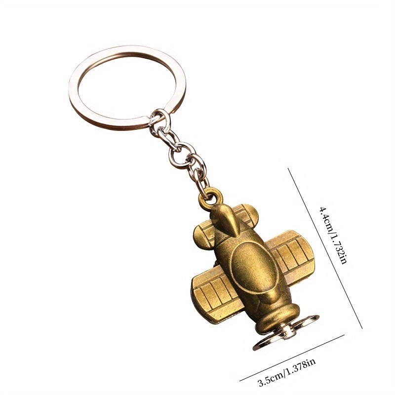 Serie de oro de aleación de venta transfronteriza caliente fútbol béisbol rugby sombrero hechicero puño llavero colgante mochila