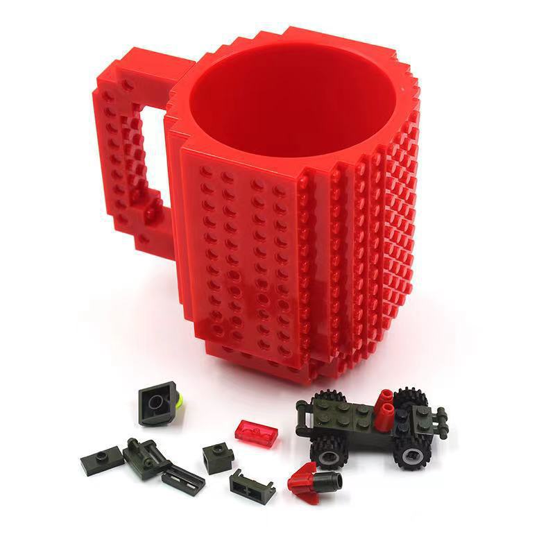 Fábrica al por mayor personalizado creativo Asamblea taza de agua educativa taza de té resistente a la gota taza de té Lego bloque de construcción