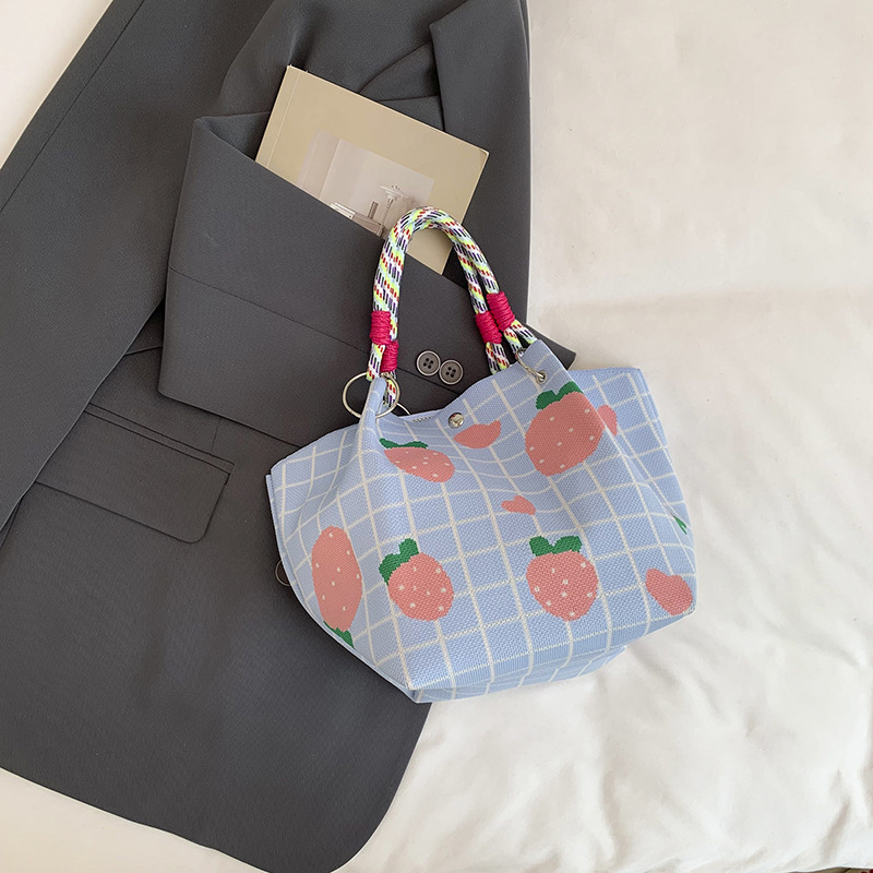Bolsa de impresión coreana de niña nicho bolso de cubo de diseño diario versátil bolso de mano para estudiantes de viaje diario