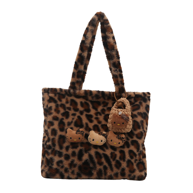 Bolsa portátil portátil de pelo retro para mujeres 2024 otoño y invierno nuevo leopardo de gran capacidad personalidad extranjera bolso de hombro