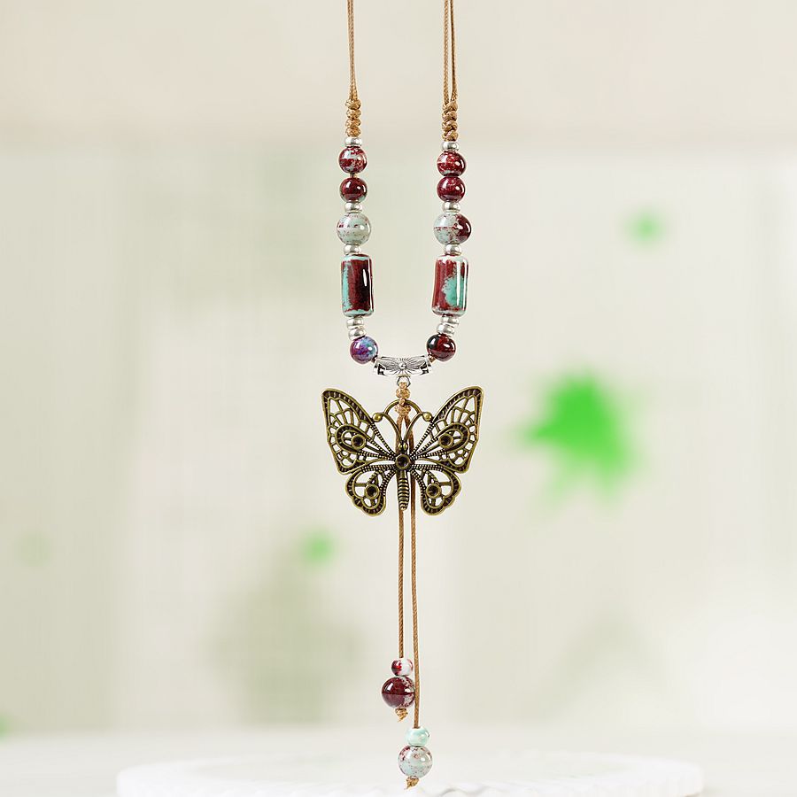 1 Piece Ethnic Style Tassel Butterfly Alloy Mixed Materials Knitting Women's Necklace display picture 5