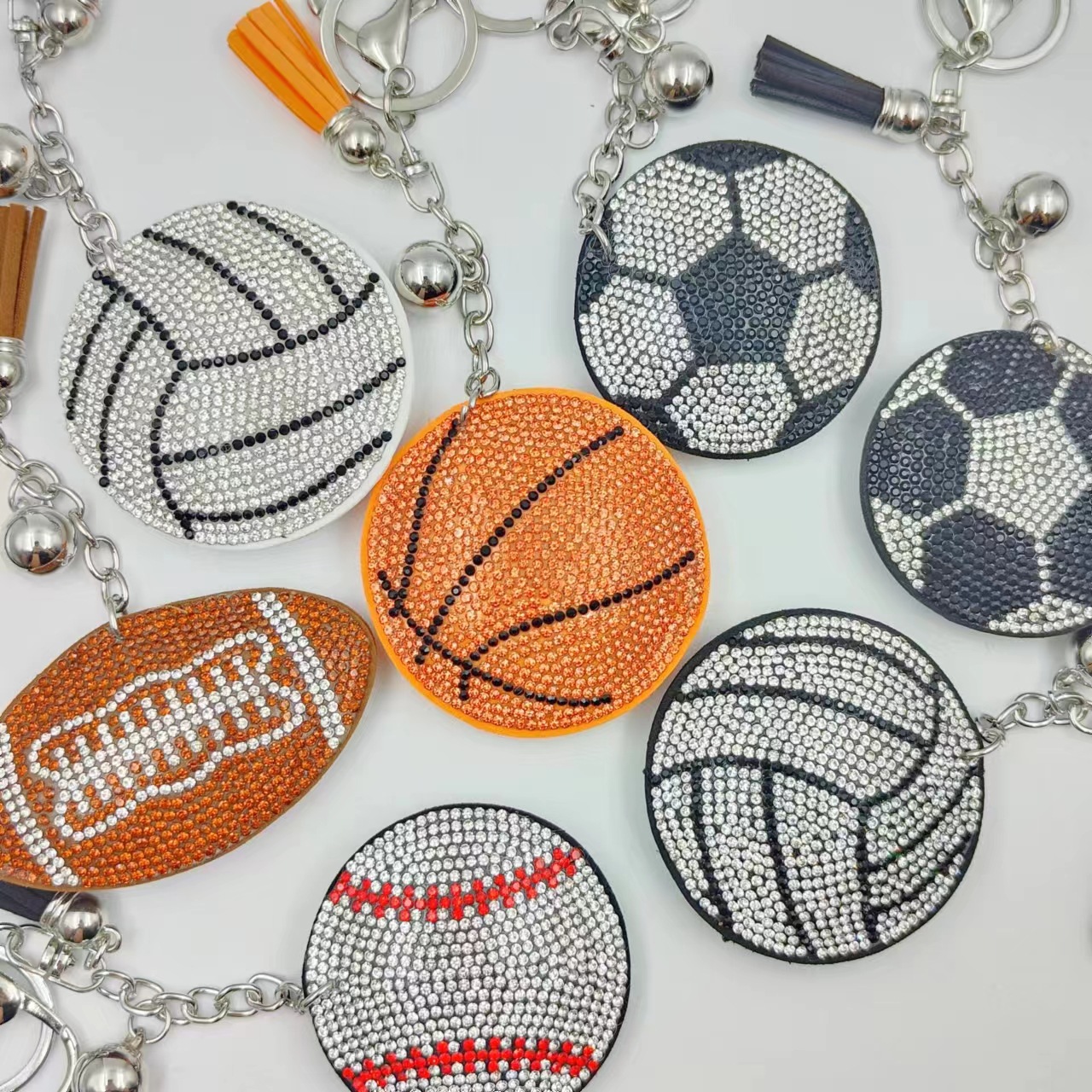Cross-border creative football basketball volleyball baseball hot diamond keychain mini fashion Japanese and Korean bag tassel pendant