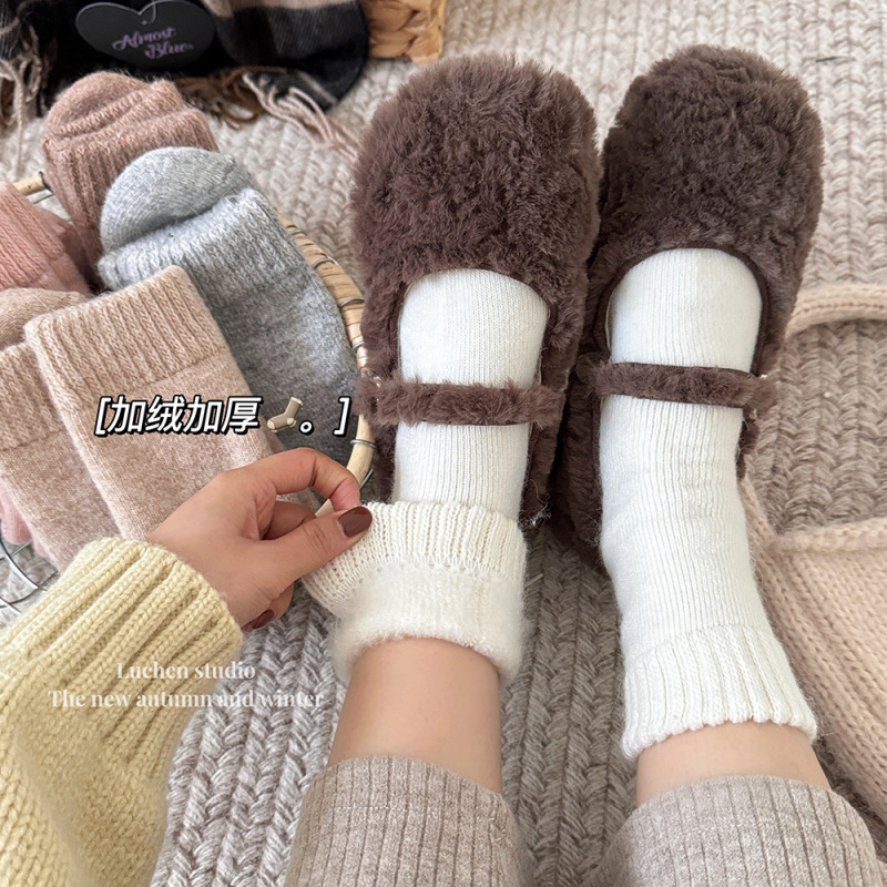 A pair of winter "thick rabbit wool socks women's mid-calf length socks autumn and winter fleece-lined warm solid color with snow boots socks