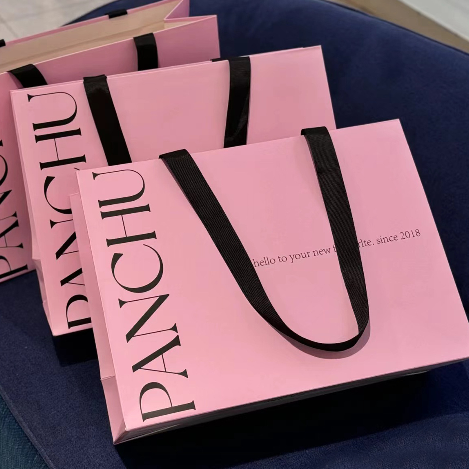 内嵌手提袋定制高档礼品纸袋定制粘绳高颜值服装店纸袋子印刷logo