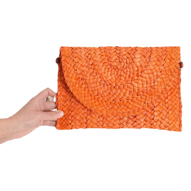 Transfronterizo caliente venta estilo coreano ins bolso tejido nuevo nicho de las mujeres de maíz bolso de paja de cuero moda embrague monedero