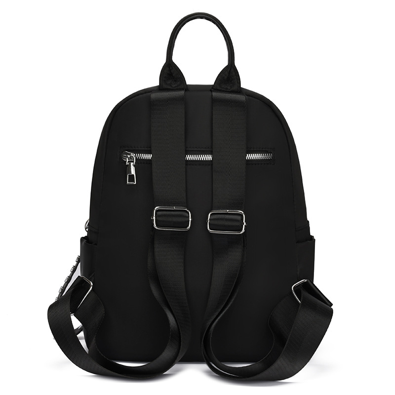 2024 verano nueva mochila de tela Oxford para mujer, color sólido, simple y ligero, mochila de viaje de viaje, mochila escolar al por mayor