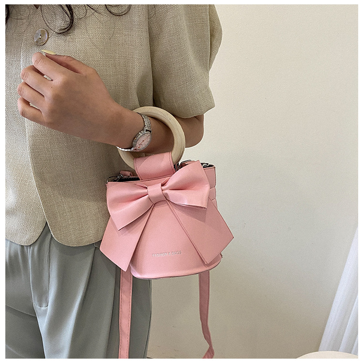 455g Weight Synthetic Leather Lining Material Sewing Thread Fashion Element Magnetic Buckle Closure Type Single Shoulder Strap, Double Handle Strap Type Bucket Bag Bags Type Casual Occasion Pu Leather Material Bow Knot Pattern All Seasons Season Women's Gender Elegant Style Bucket Shape Small Size Women's Small Pu Leather Bow Knot Elegant Sewing Thread Bucket Magnetic Buckle Bucket Bag 18