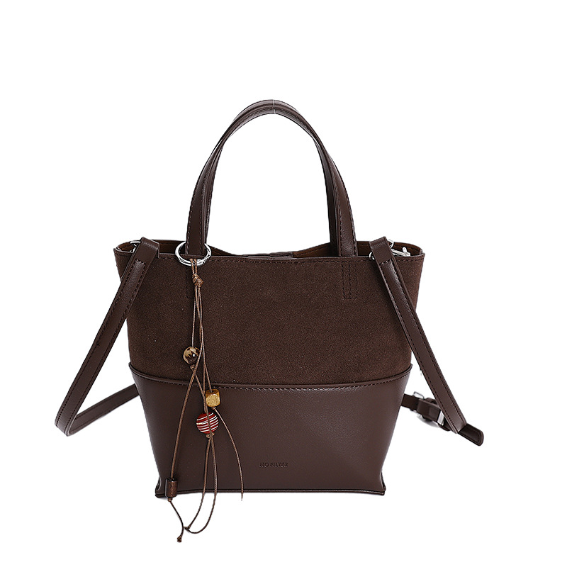 Bolso de moda transfronteriza retro bolso de cubo de agua mujer otoño y invierno 2025 nuevo estilo versátil bolso de hombro de viaje