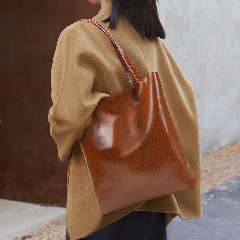 2024 primavera y verano nuevo estilo bolso de piel de vaca bolso de cuero para mujer de moda bolso de cuero simple bolso de compras portátil de gran capacidad