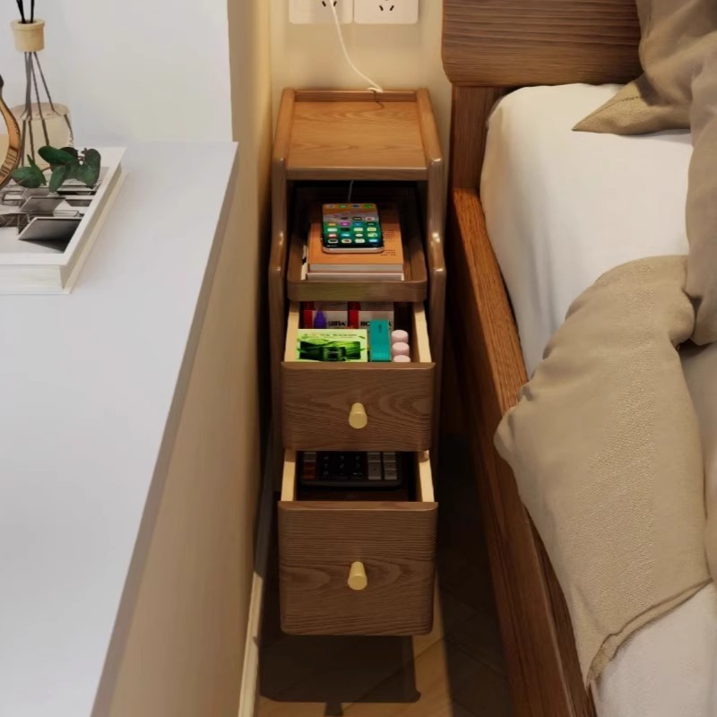 Mesa de cama de madera maciza dormitorio doméstico estante de cama ultra estrecho 2025 explosión estilo medieval armario de almacenamiento de grietas