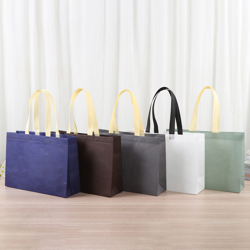 Fábrica de bolsas de tela no tejida de contraste de color publicidad bolsa de compras bolsa en blanco engrosada bolsa