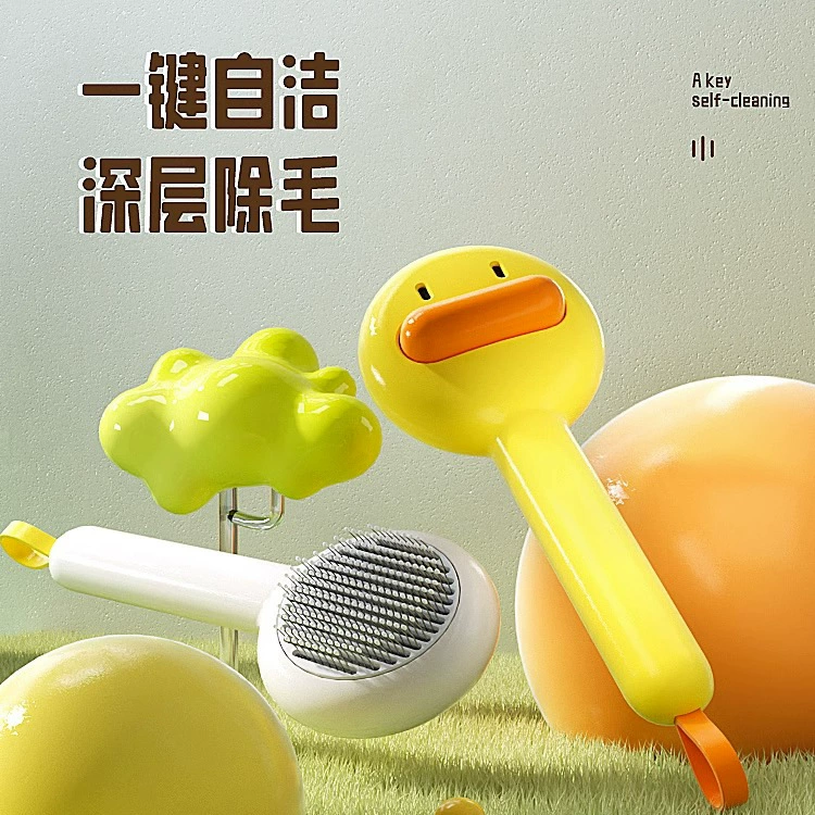 Маленькая желтая утиная расческа для кошки расчесывает щетку для домашних животных