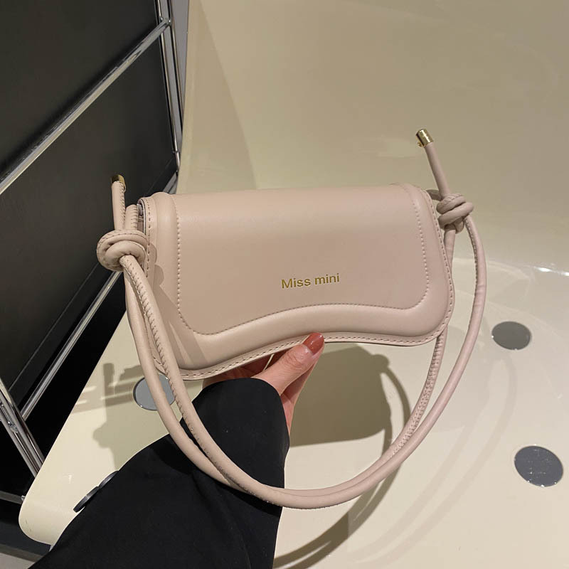 Textura bolso de axila portátil 2024 primavera nueva moda bolso de mensajero francés color sólido bolso cuadrado pequeño retro de un solo hombro